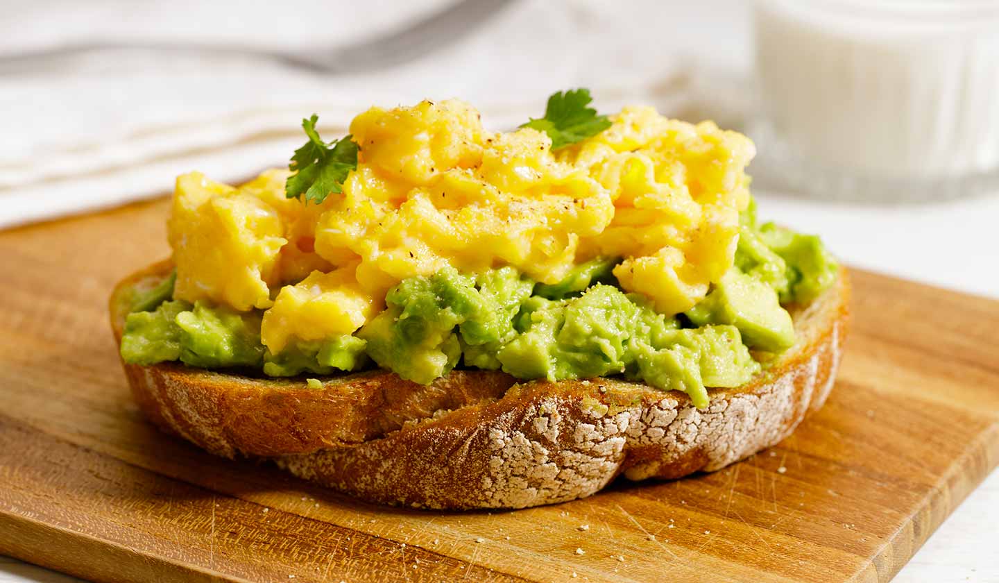 Bread with avocado and scrambled egg