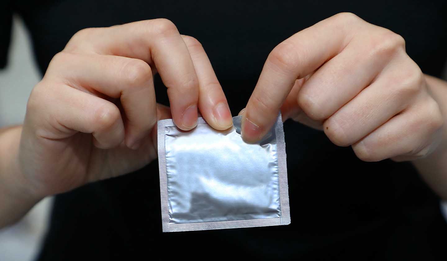 Open the condom package correctly